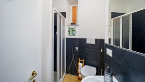 Shower, eco-friendly toiletries, hair dryer, bidet