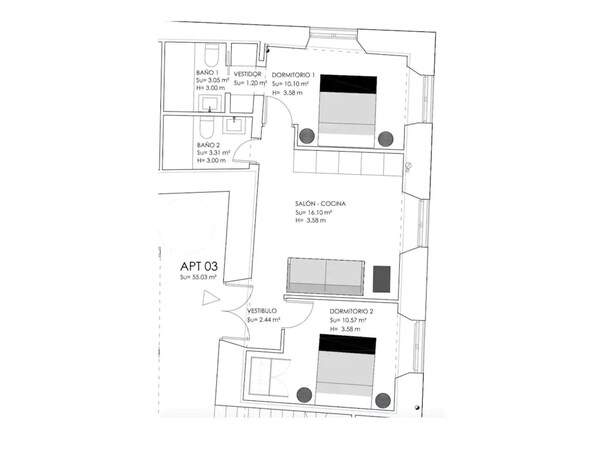A floor plan of a hotel with two bedrooms, two bathrooms, a kitchen, and a living area.