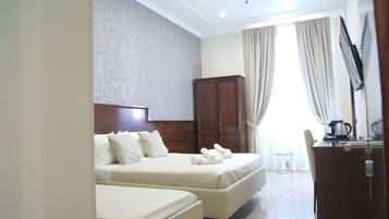 Triple Room, City View | Premium bedding, down duvets, memory-foam beds, minibar