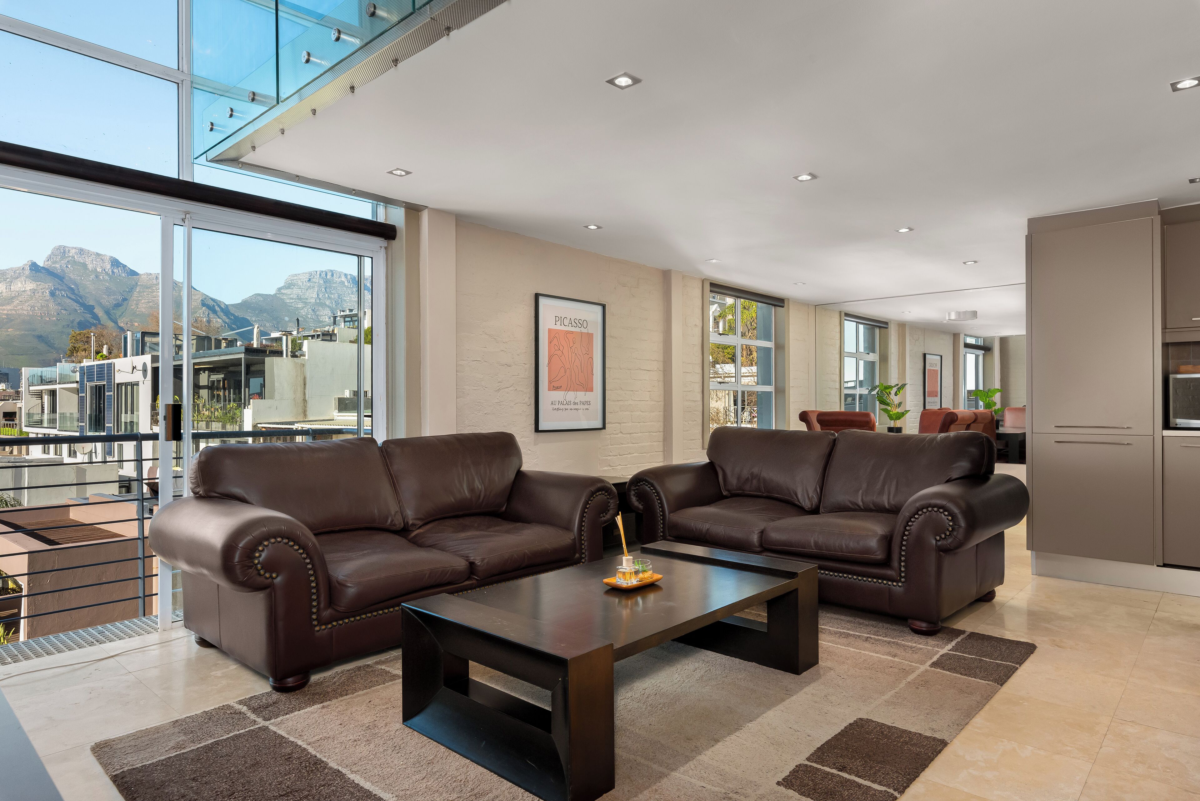 Exclusive Apartment | Living area | 50-inch flat-screen TV with cable channels, Netflix, streaming services