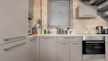 Exclusive Apartment | Private kitchen | Fridge, microwave, oven, stovetop