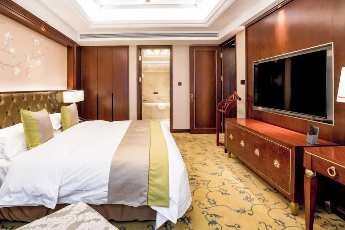 Roupas de cama premium, edredons de pluma, frigobar, cofres nos quartos