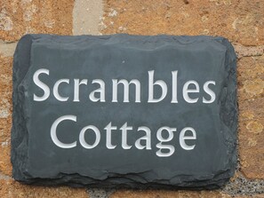 A slate sign with the words "Scrambles Cottage" indicating a property name. - Scrambles Cottage (Stoke-sub-Hamdon)