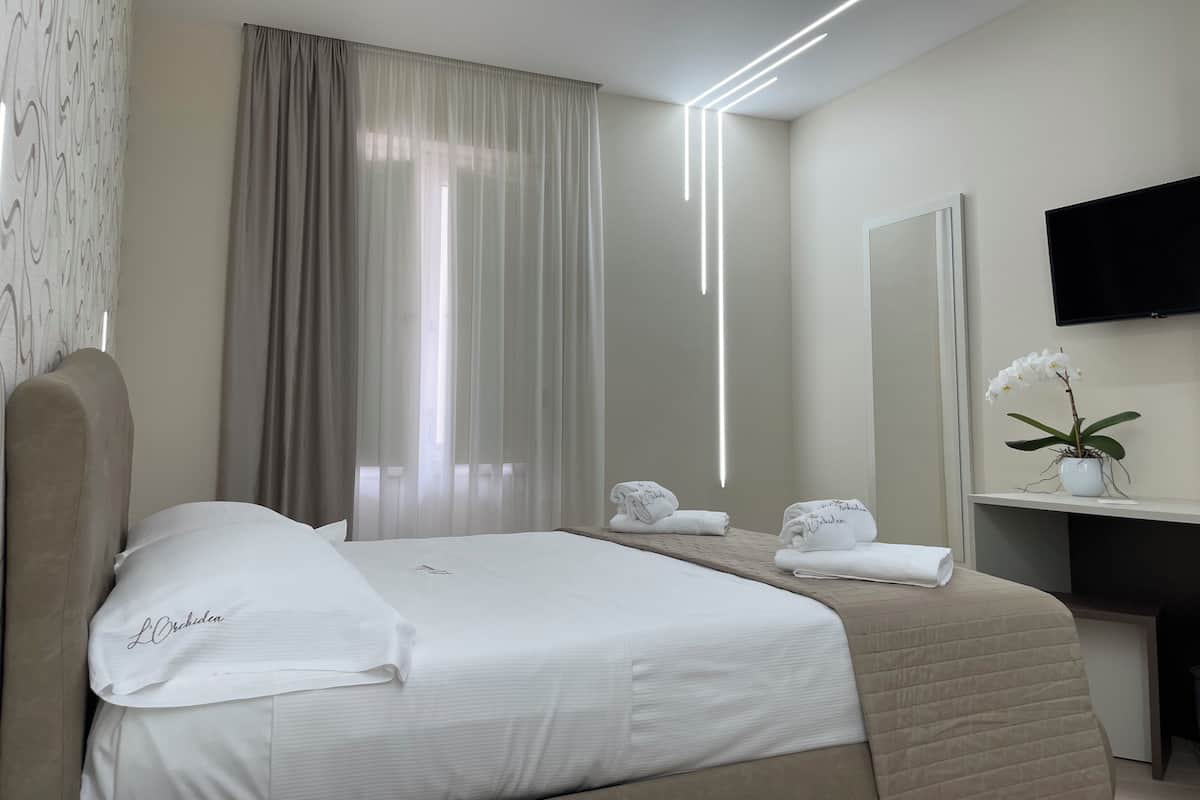 Exclusieve kamer | 1 slaapkamer, luxe beddengoed, bedden met traagschuimmatras, een minibar