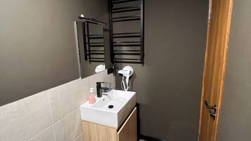 Hair dryer, towels, soap, toilet paper