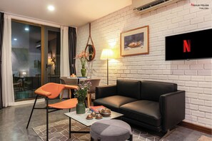 Minibar, in-room safe, desk, laptop workspace - Nexus House Thao Dien (Ho Chi Minh City)