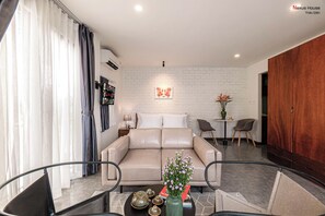 Minibar, in-room safe, desk, laptop workspace - Nexus House Thao Dien (Ho Chi Minh City)