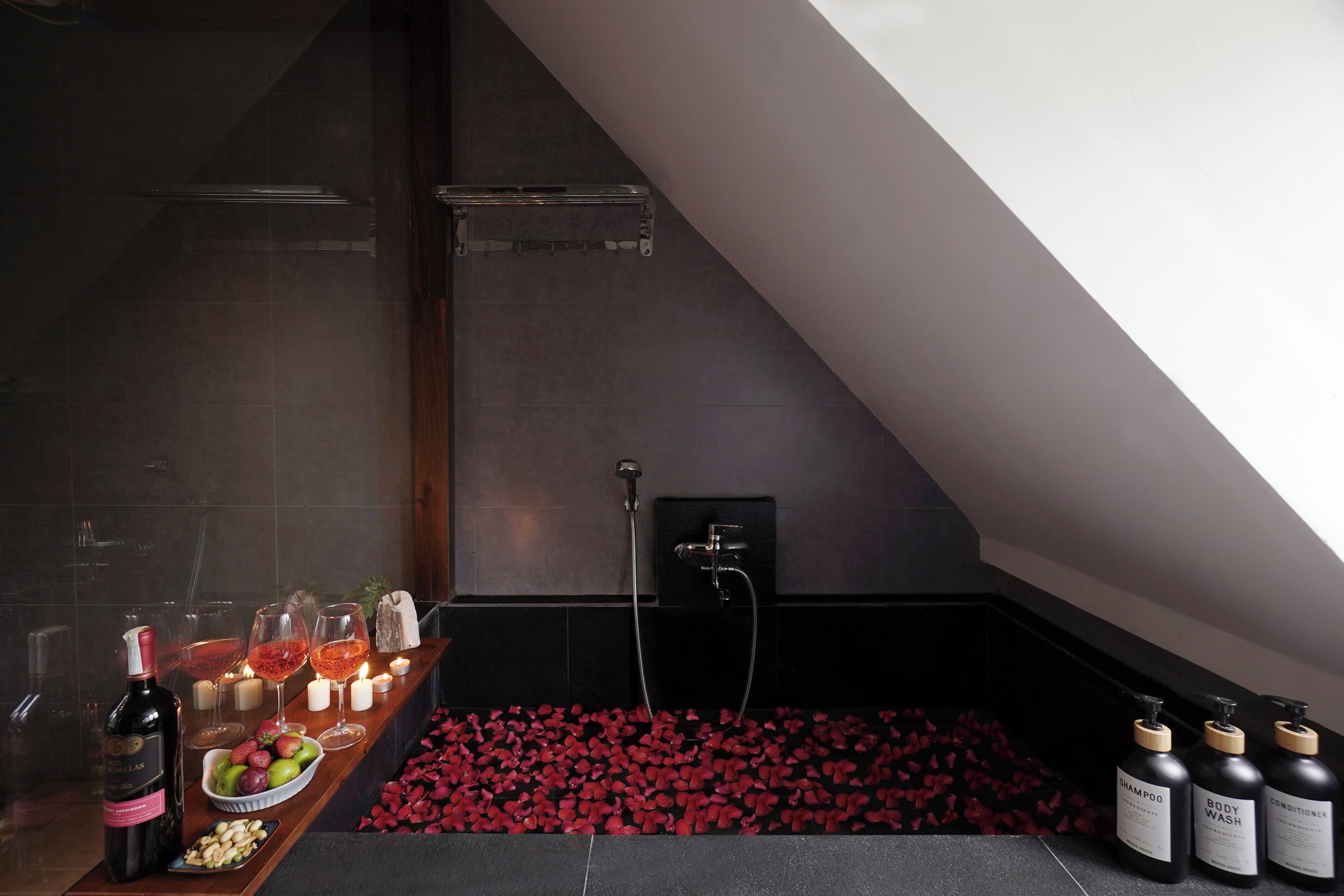 Designer toiletries, hair dryer, bathrobes, slippers