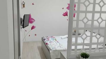 1 habitación, tabla de planchar con plancha, wifi gratis y ropa de cama