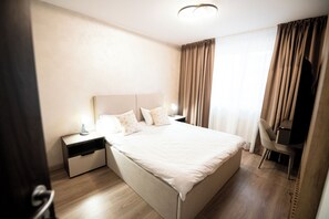 1 dormitori, planxa i posts de planxar, wifi gratuïta i roba de llit 