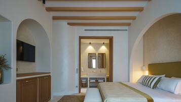 Habitación Deluxe | Sábanas italianas Frette, ropa de cama de alta calidad y edredón