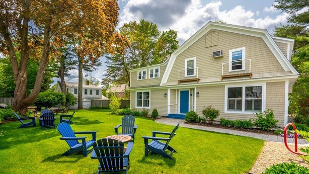 A two-story house with a well-maintained lawn and outdoor seating area. - Beautiful inn, Lighthouse Landing. #2 Sea Cliffs (Ogunquit)