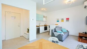 A modern apartment with a kitchen, dining area, and living room. - Hedera Estate, Hedera A35 (Dubrovnik)