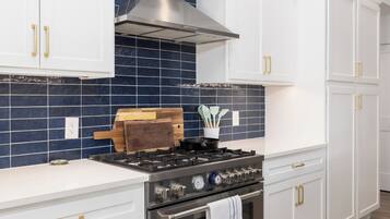 Fridge, coffee/tea maker, cookware/dishes/utensils