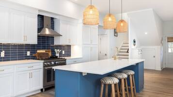 Fridge, coffee/tea maker, cookware/dishes/utensils