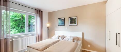 2 dormitorios, tabla de planchar con plancha, wifi y ropa de cama