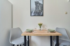 Apartment, 1 Bedroom, Balcony | Private kitchen | Microwave, cookware/dishes/utensils, dining tables - Apartment Zaułek Rogoziński (Wroclaw)