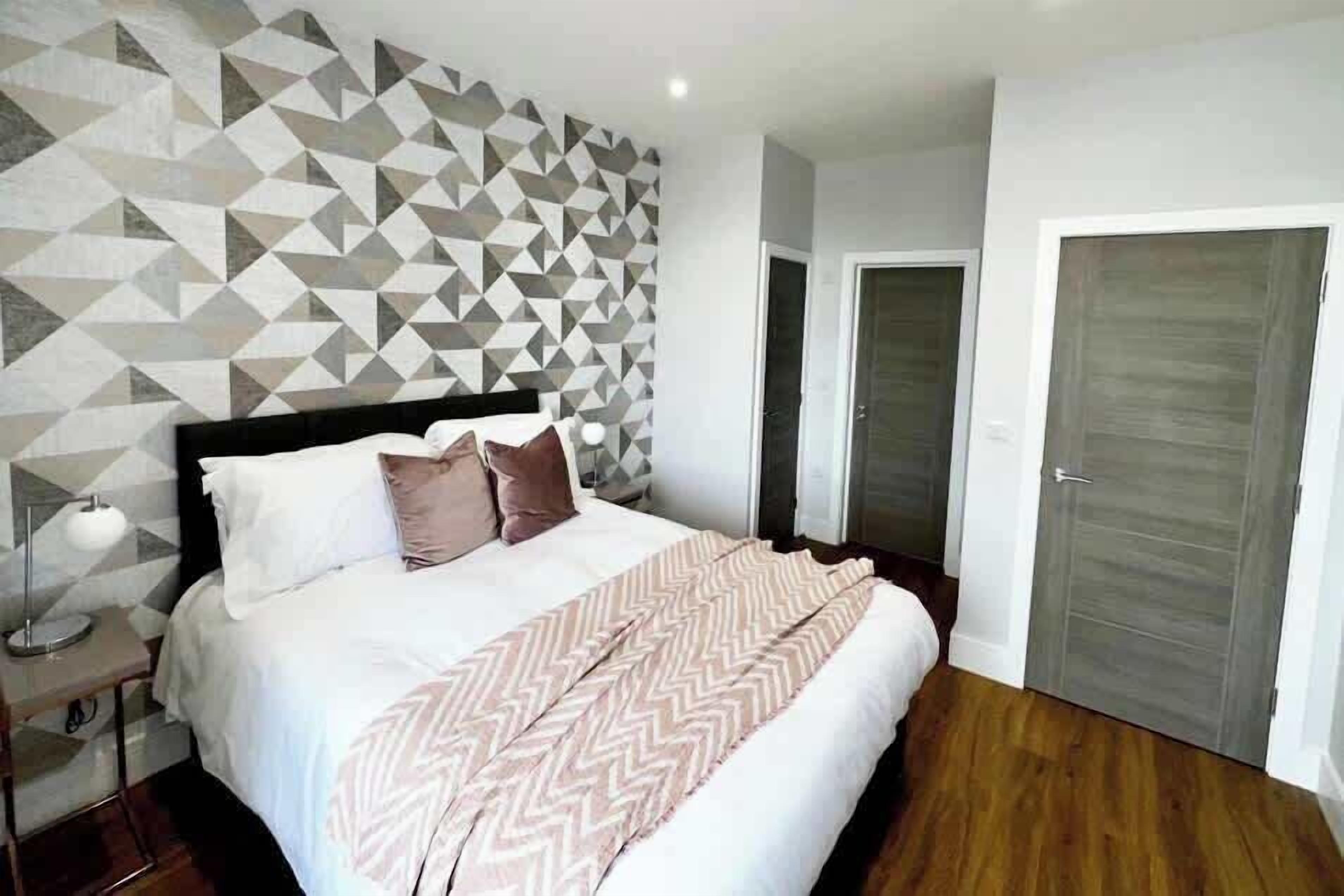 1 bedroom, desk, iron/ironing board, travel crib