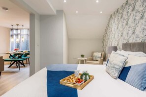 1 habitación, tabla de planchar con plancha, cuna de viaje y wifi 