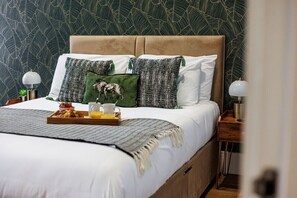 2 habitaciones, tabla de planchar con plancha, cuna de viaje y wifi