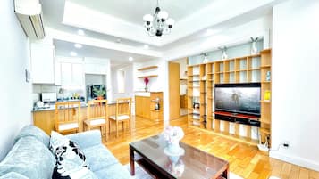 Luxury Apartment, 1 Bedroom, City View | Living area | 39-inch LED TV with cable channels, Netflix, streaming services