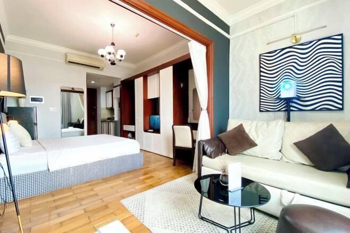 Premium bedding, laptop workspace, blackout drapes, soundproofing