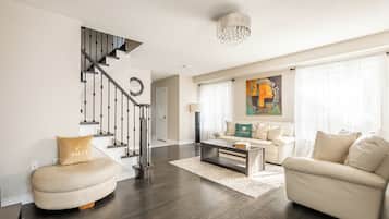 Elite House, 3 Bedrooms | Living area | 52-inch flat-screen TV with cable channels, Netflix, Hulu