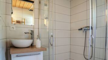 Shower, hair dryer, bathrobes, towels