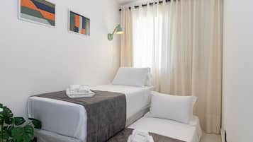 Departamento básico | 2 habitaciones, espacio para trabajar con laptop y wifi gratis