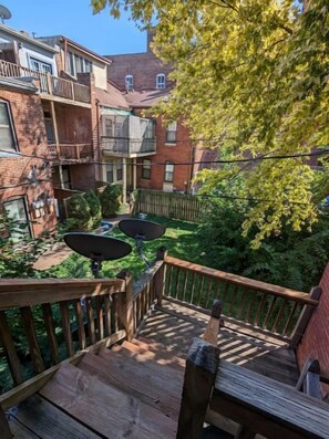 Enjoy outdoor dining or relaxation on the deck with a view of the surrounding neighborhood.