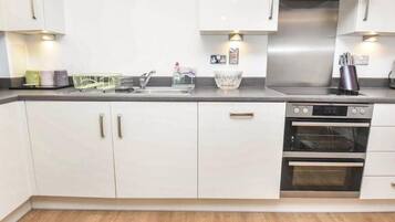 Apartment | Private kitchen | Fridge, microwave, oven, stovetop