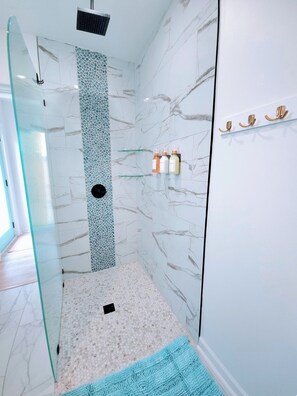 Shower, hair dryer, towels, soap