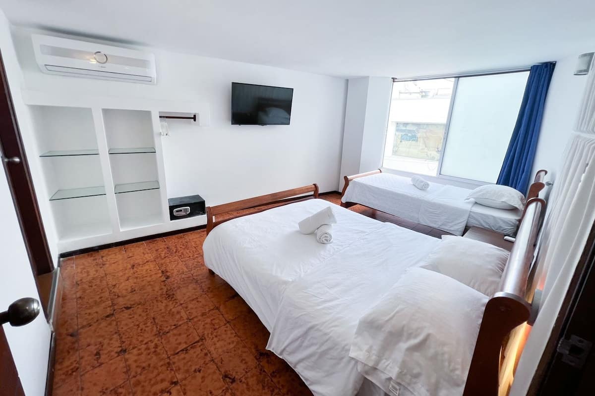 1 habitación y ropa de cama