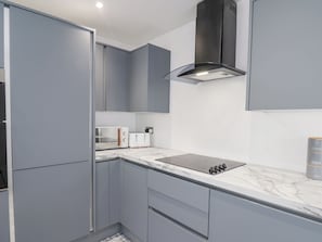 Fridge, electric kettle, toaster, cookware/dishes/utensils