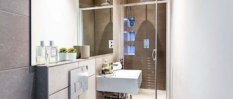 Bathtub, hair dryer, towels