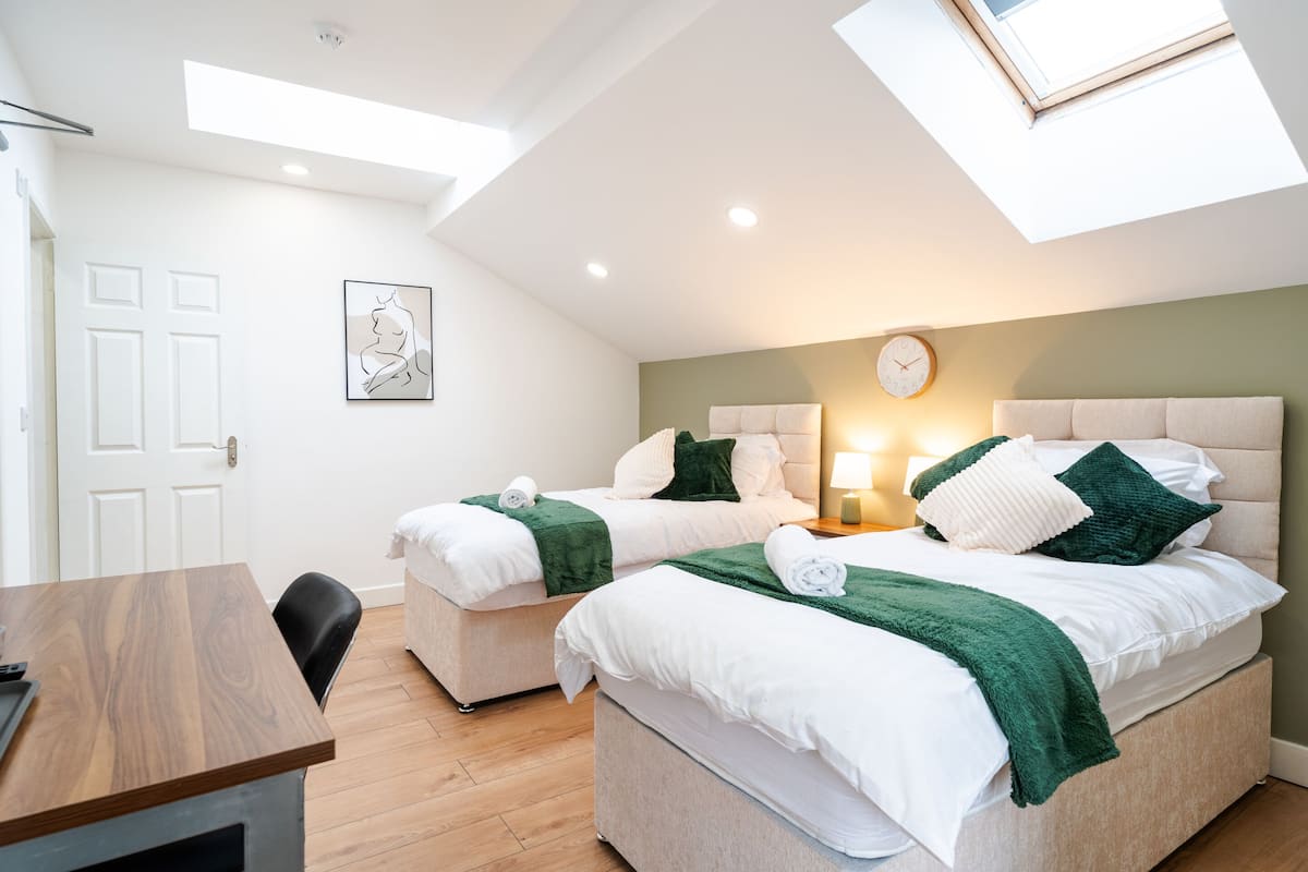 Deluxe Suite, Private Bathroom (Second floor) | 1 bedroom, memory foam beds, desk, laptop workspace