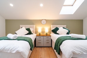 Deluxe Suite, Private Bathroom (Second floor) | 1 bedroom, memory foam beds, desk, laptop workspace