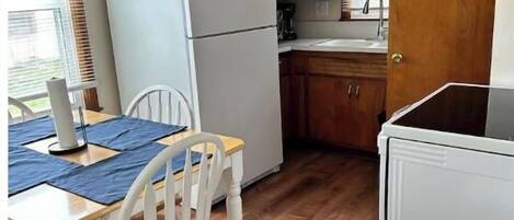 Fridge, microwave, stovetop, cookware/dishes/utensils