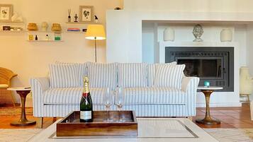 Smart TV, fireplace, foosball