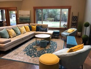 Smart TV, fireplace, table football, books