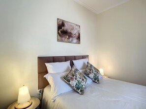 1 habitación, tabla de planchar con plancha, wifi gratis y ropa de cama 