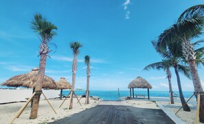 Relax on the beach with a stroll along the paved path to the ocean.