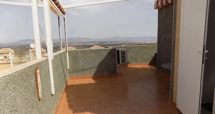 Two bedroom Town house with basement, aircon, communal pool, wifi and sea views