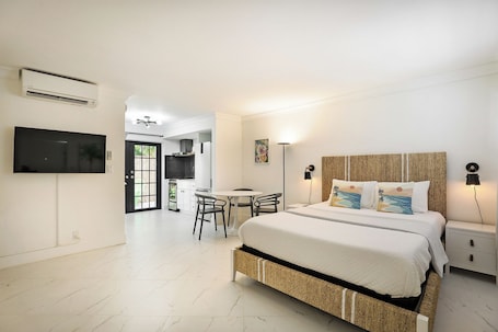 Parent's Suite | Blackout curtains, iron/ironing board, free WiFi, bed sheets. La Mer Suites