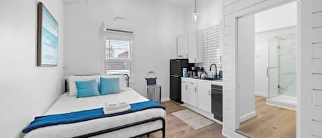1 bedroom, desk, iron/ironing board, travel cot