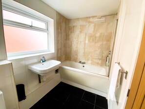 Hair dryer, towels, soap, shampoo