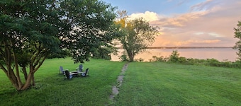 Peaceful Suite on the Water "Osprey." Sunrise over the river from your porch.