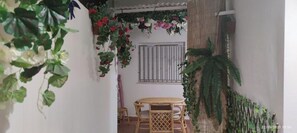 Relax in a serene space surrounded by lush greenery and natural beauty.