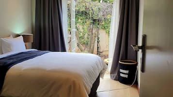 2 habitaciones, tabla de planchar con plancha, wifi y ropa de cama