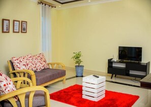 Living area - One-Bedroom Apartment (Kampala)